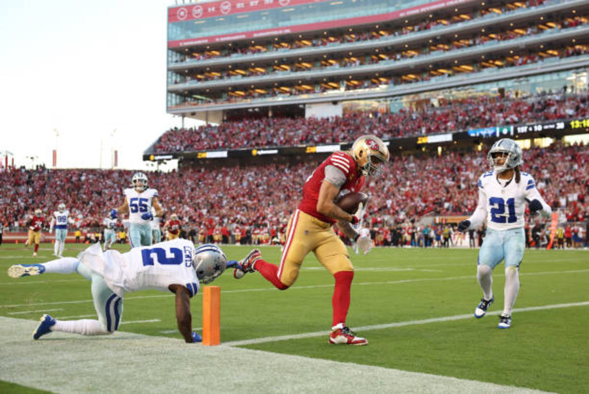 George Kittle scores one of his three TDs in a rout of the Cowboys.